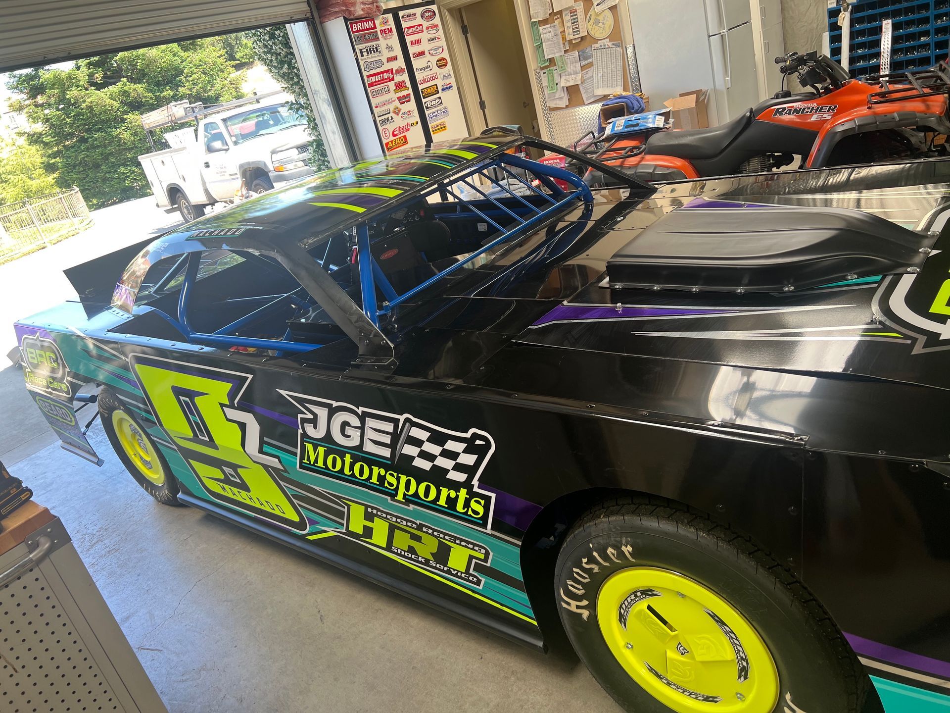 a race car with the word motorsports on the side