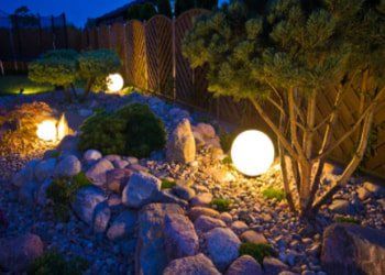 Outdoor orb lighting in plant bed in Carson City NV