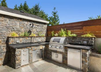 Outdoor kitchen and counter top in dark stone installed in Carson City NV