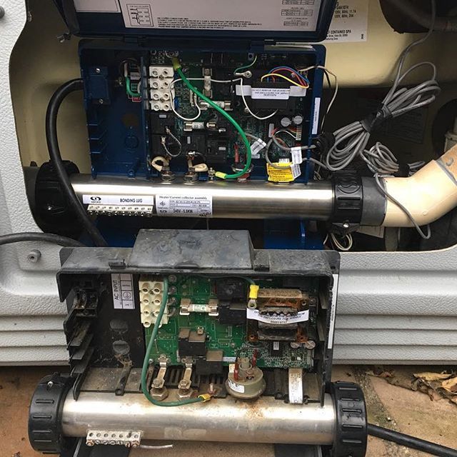 The inside of a hot tub with a bunch of wires coming out of it