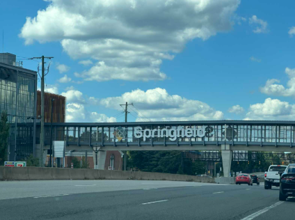 An enclosed pedestrian bridge labeled An enclosed pedestrian bridge labeled