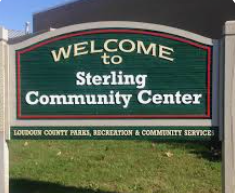 A sign for the Sterling Community Center, green with white lettering, under Loudoun County Parks, Recreation & Community.