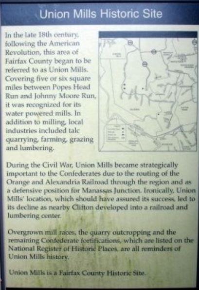 A historical sign titled Union Mills Historic Site, featuring descriptive text and a map of the region. A historical sign titled Union Mills Historic Site, featuring descriptive text and a map of the region.