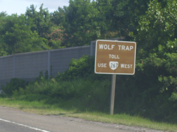 A brown road sign reads A brown road sign reads