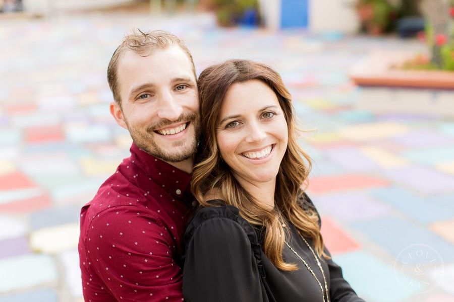 A man and a woman are posing for a picture and smiling for the camera - Sean's Auto Care