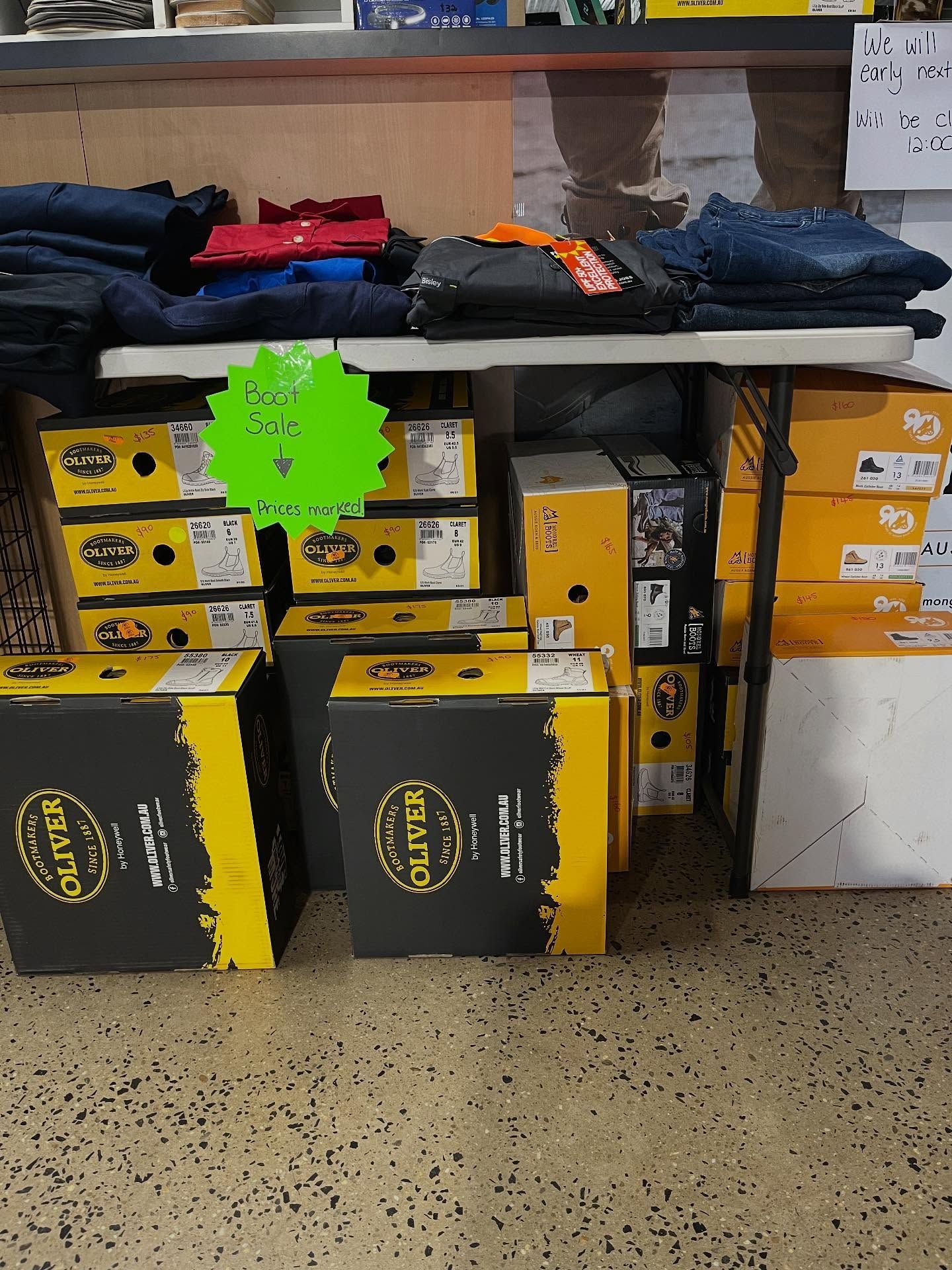 A Display of Work Boots and Clothing — Tolga Traders in Tolga, QLD