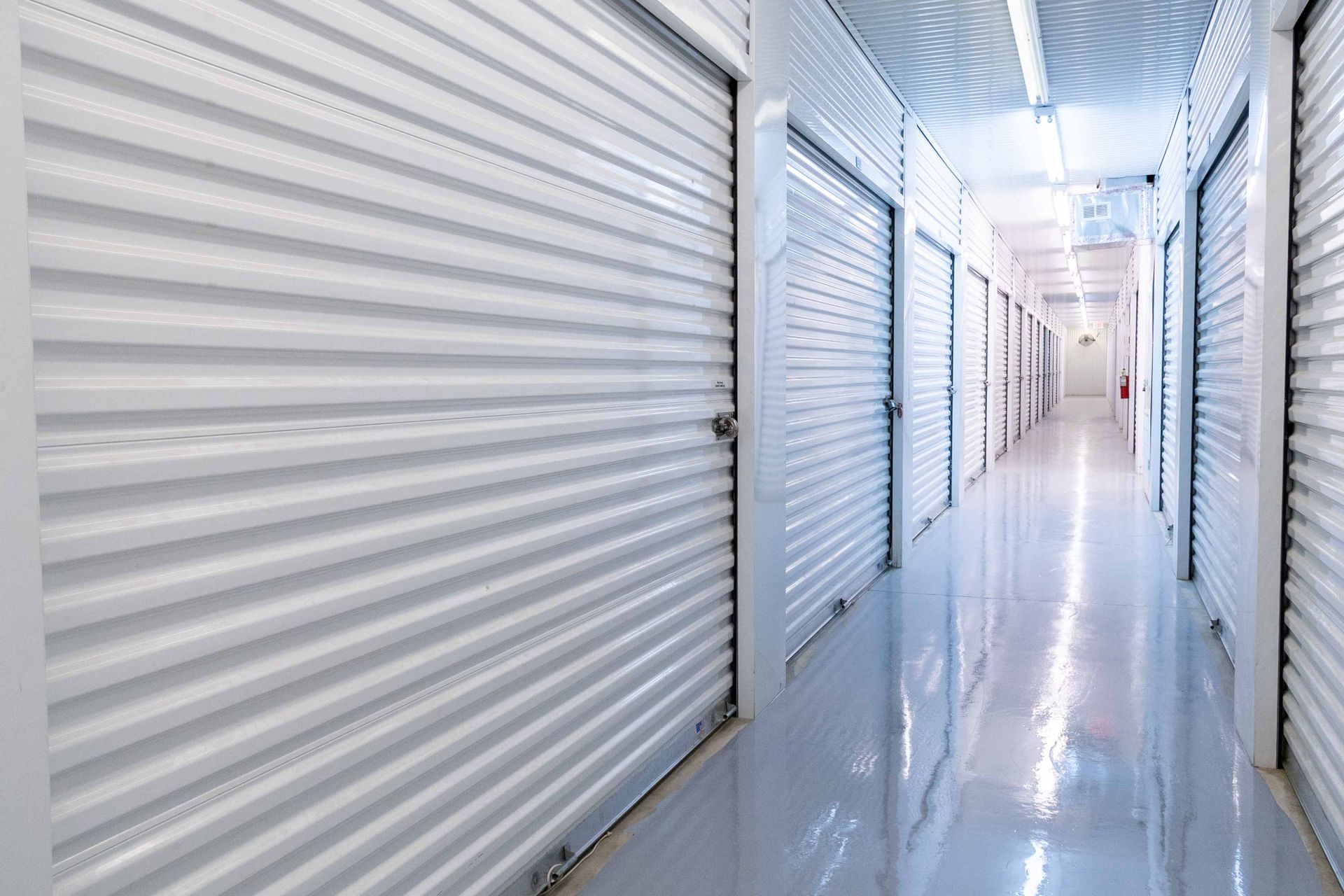 Climate-controlled indoor storage hallway at Ship-N-Store in Baker, LA
