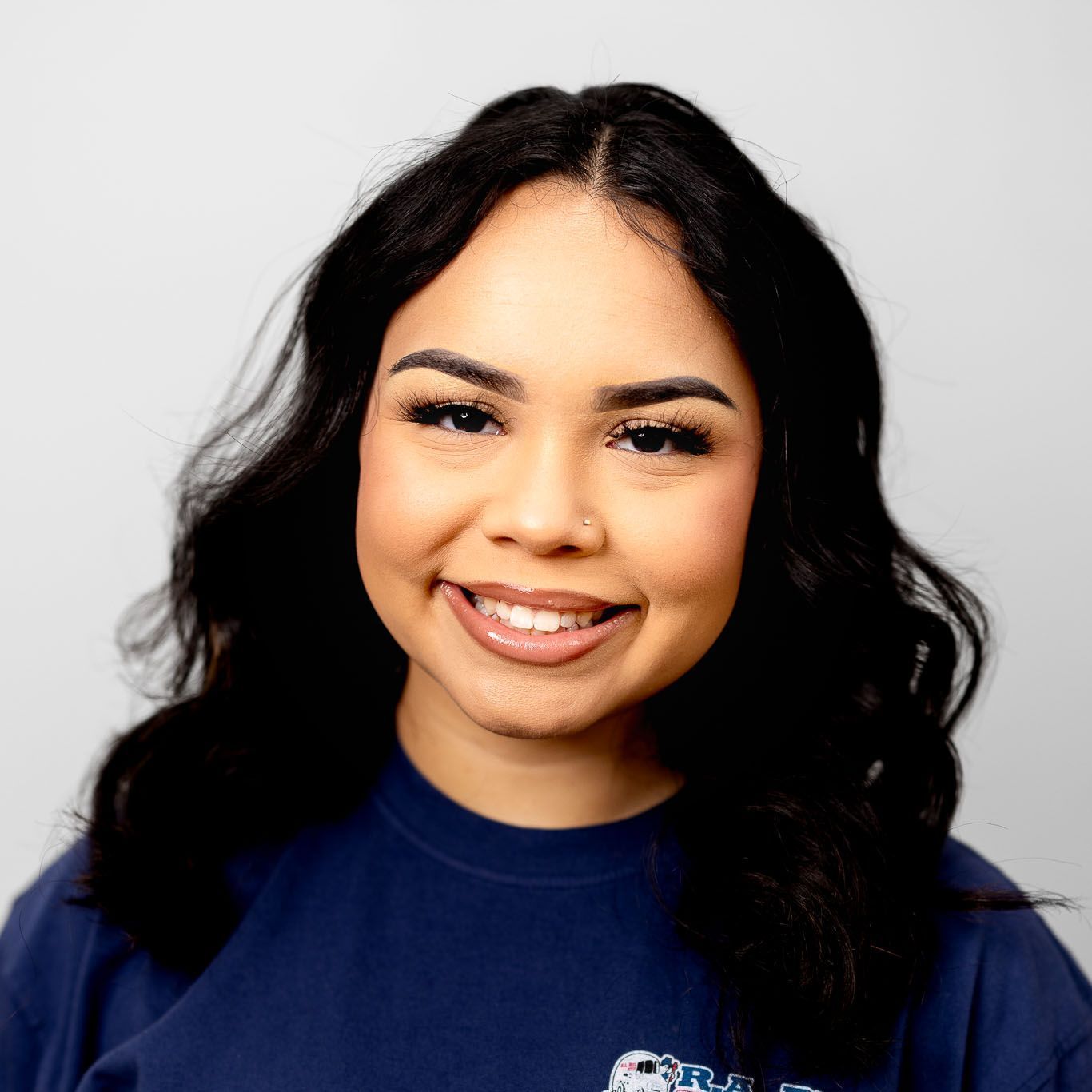 Smiling young woman that works at R. A. Biel.