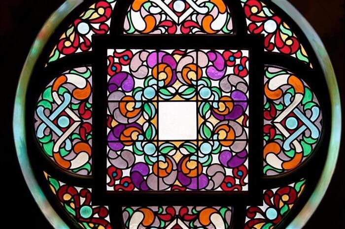 A stained glass window with a square in the middle