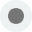 A close up of a gray circle on a white background.