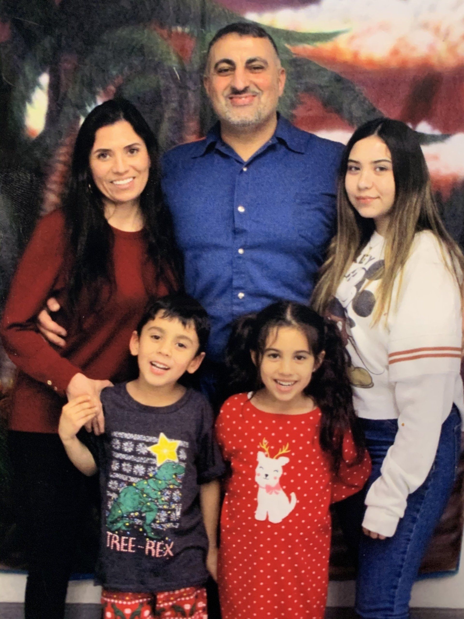 Photograph of Last Prisoner Project constituent Rudi Gammo and his family.