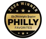 2024 Winner badge for The Philadelphia Inquirer’s Philly Favorites, black and gold with stars