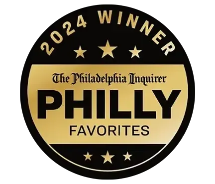 2024 Winner badge for The Philadelphia Inquirer’s Philly Favorites, black and gold with stars