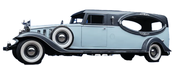 Vintage light blue classic car with black roof and whitewall tires, shown in side view.