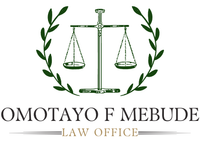 A logo for Omotayo F Mebude Law Office with a scale of justice and a laurel wreath.