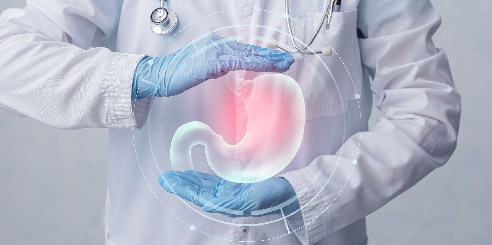 doctor holding digestive tract diagram