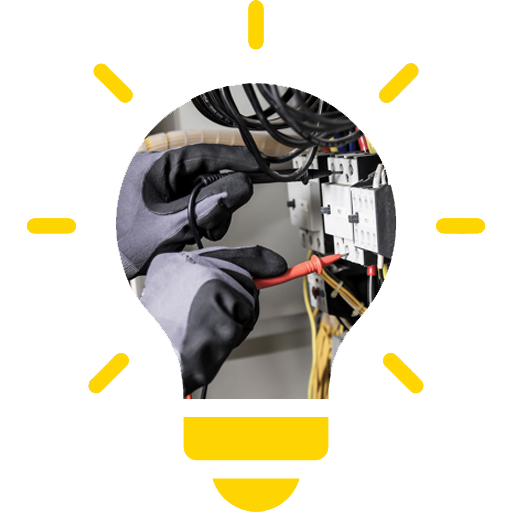 A person is working on a light bulb with a screwdriver.