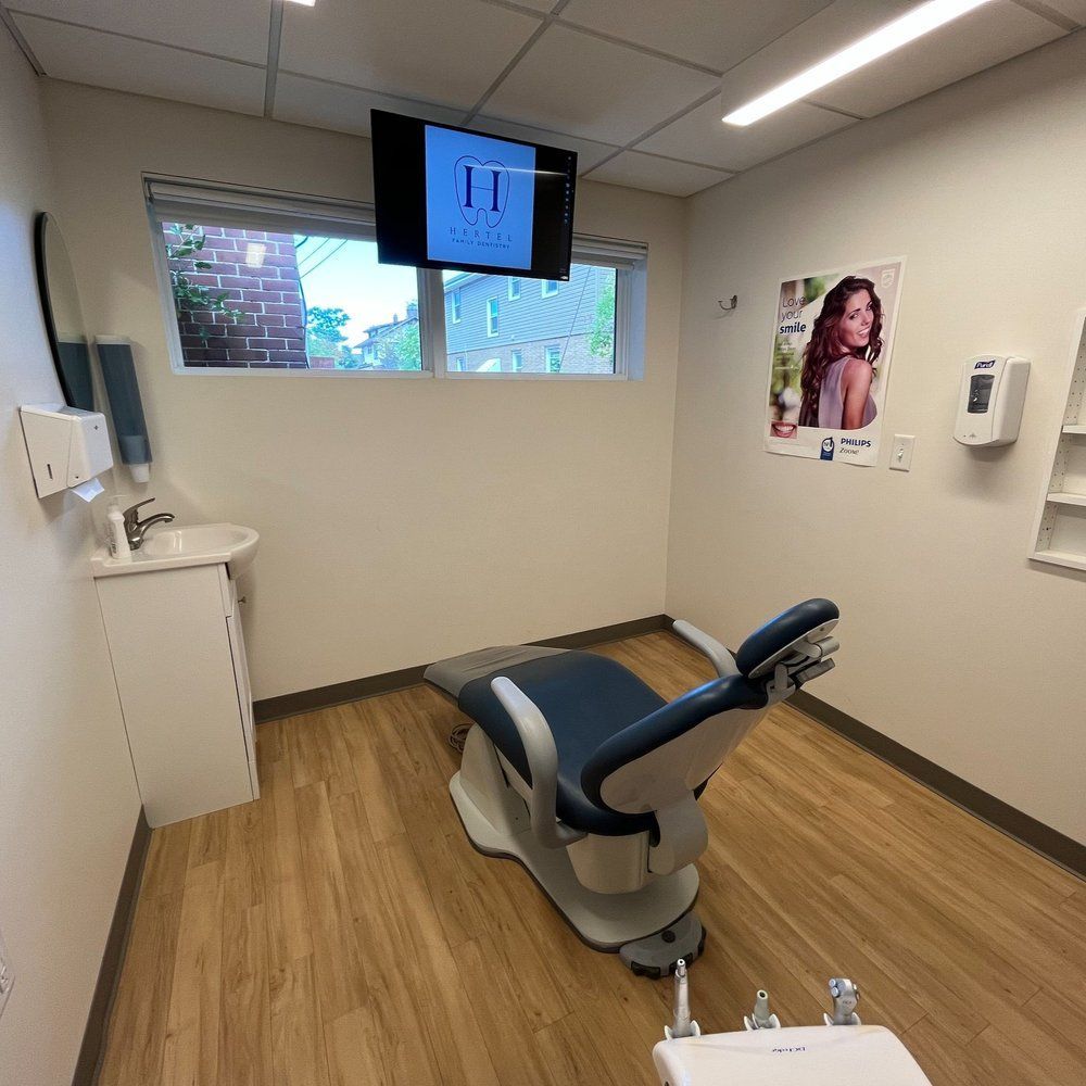 A Dental Office With Television on the Ceiling - Buffalo, NY - Hertel Family Dentistry