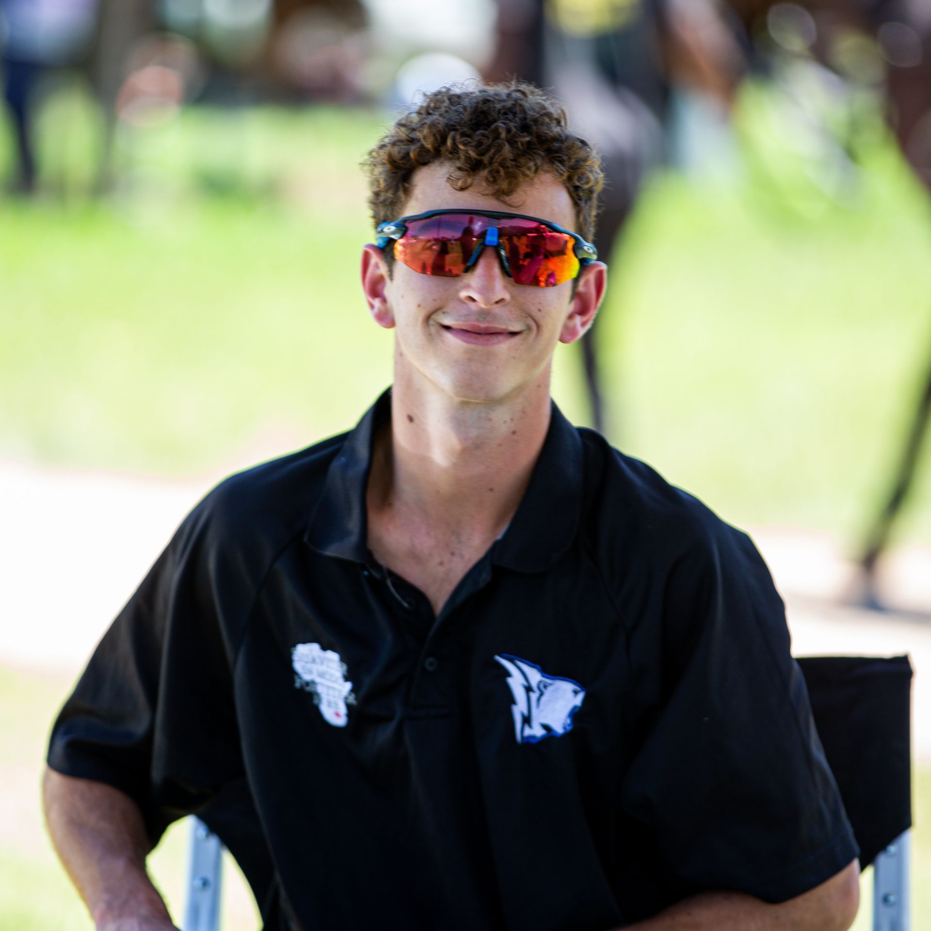 Daniel Batchelor wearing Oakley Polo glasses and a black shirt in South Africa