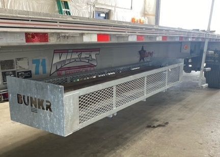 photo of Bunkr galvanized dunnage rack no drill mounted to flatbed trailer