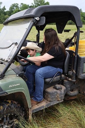 women in tractor