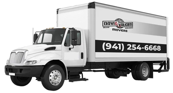 White moving truck with company logo and phone number.