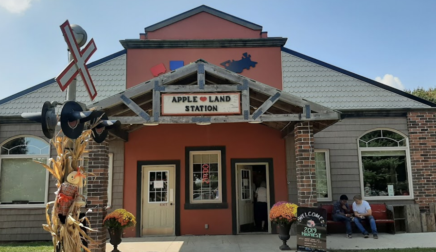 The main building of Apple Land Station; it has railway crossing signs to make it look like a real train station