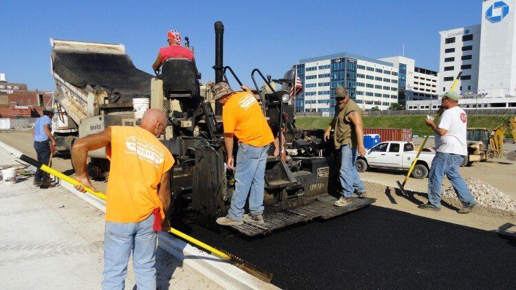 Workers Asphalting Road — East Peoria, IL — Tazewell County Asphalt Company