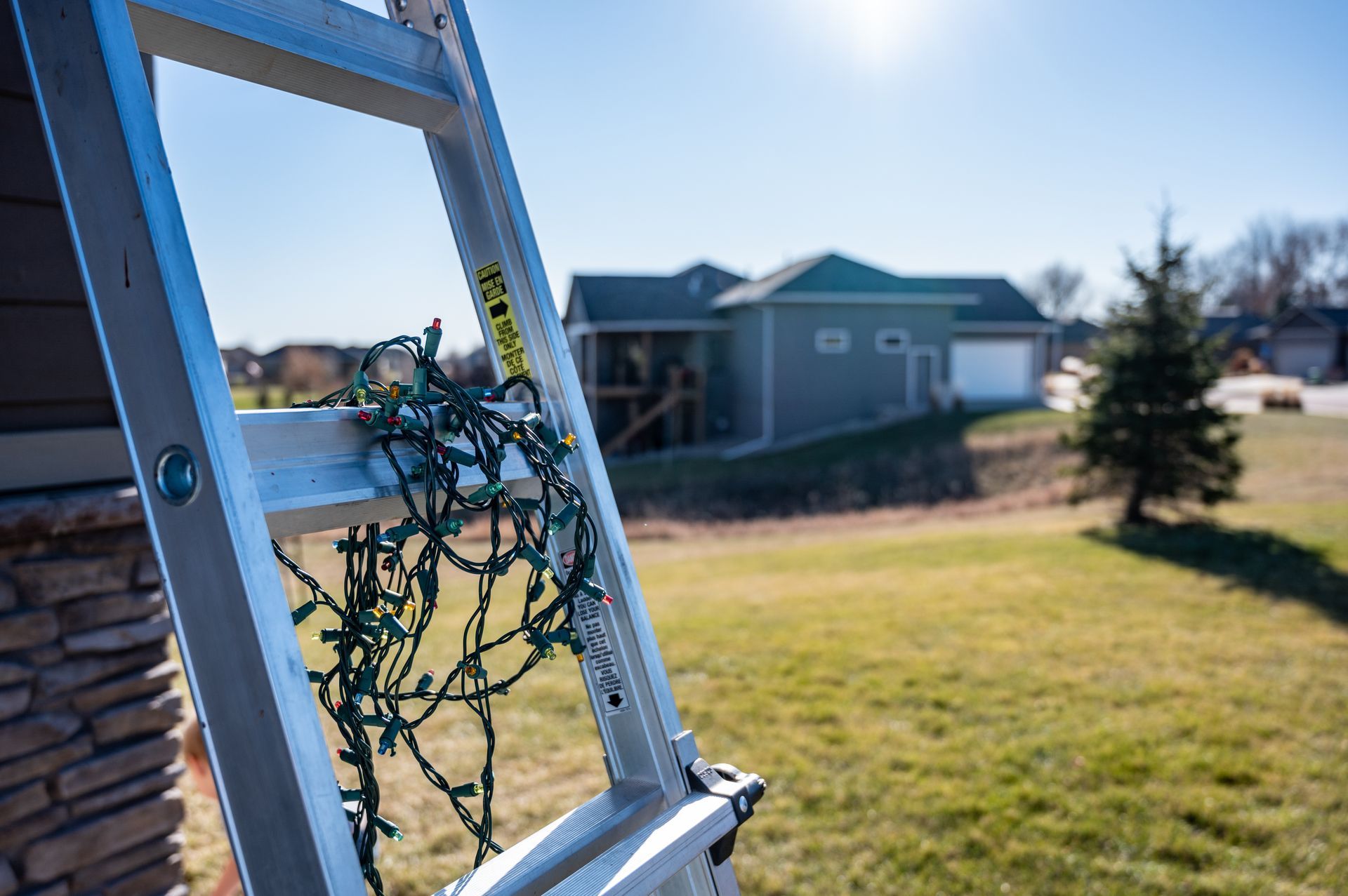 Christmas lights on ladder