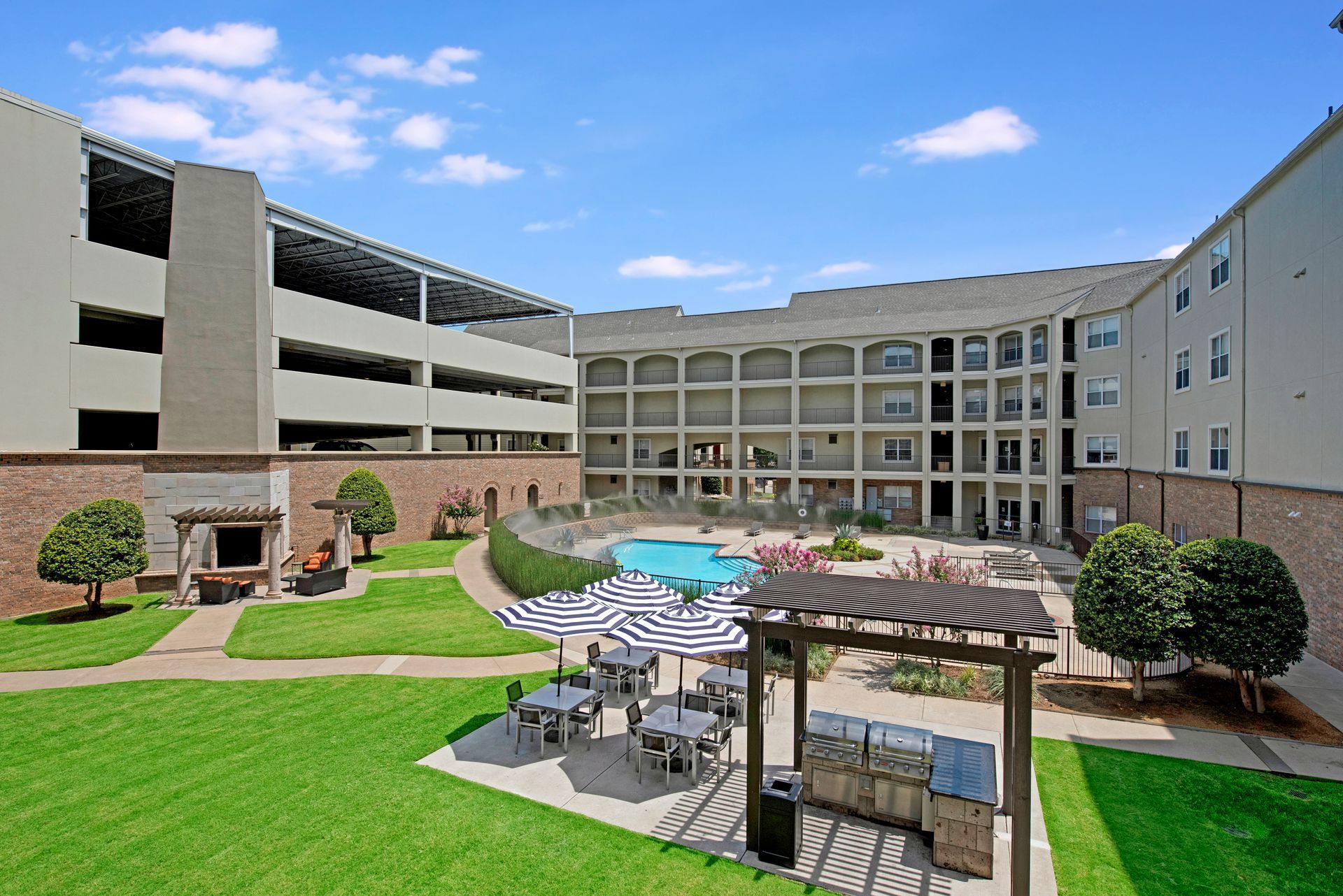 cabana, chairs, pool in center of property