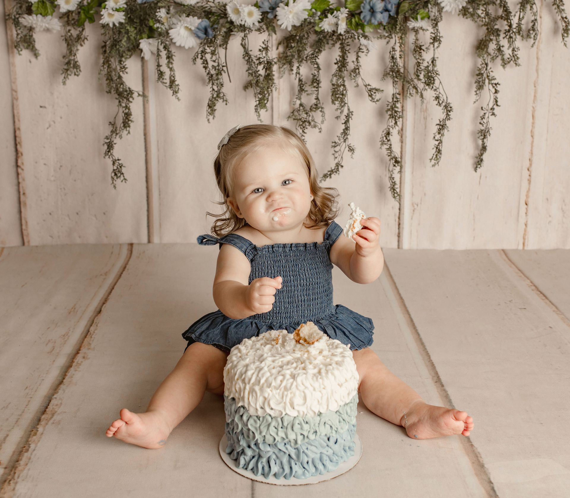 A baby first birthday photoshoot. Cake smash photos.