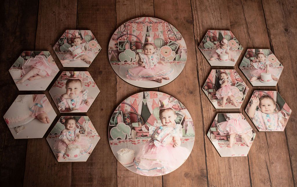 A wooden floor with a bunch of pictures on it.