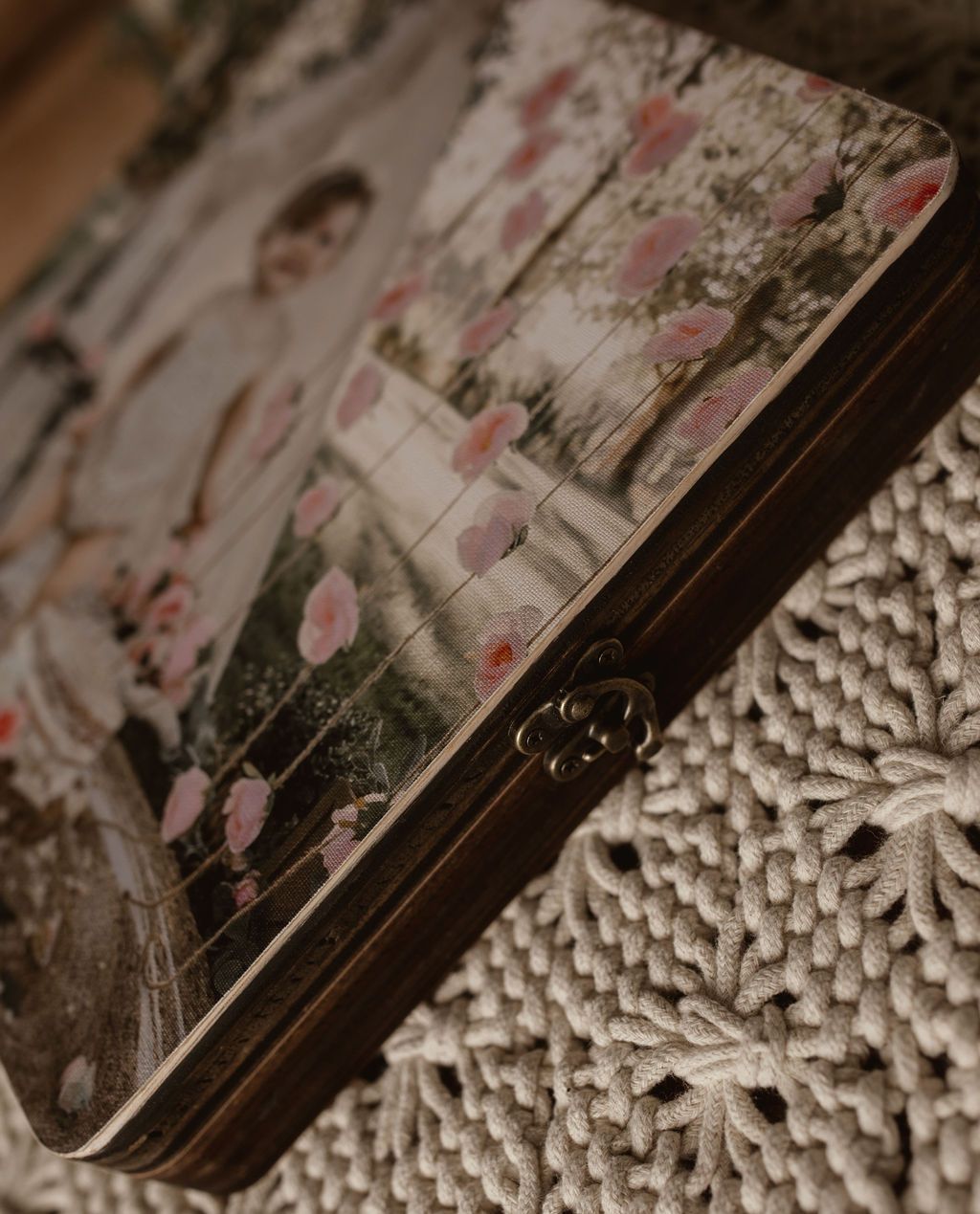A wooden box with a picture of a bride and groom on it.