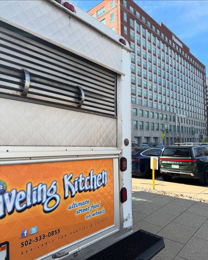 A food truck that says eveling kitchen on it