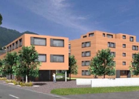 Eine künstlerische Darstellung eines neuen Wohnhauses