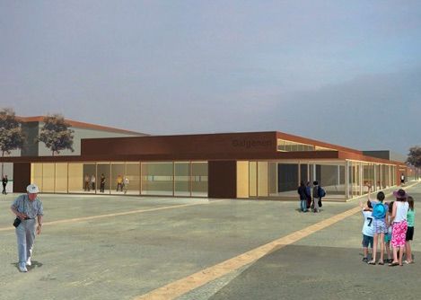 Eine Gruppe von Menschen steht vor einem großen Gebäude