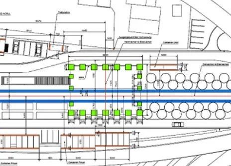 Eine schwarz-weiße Zeichnung eines Gebäudes mit einem grünen Quadrat in der Mitte