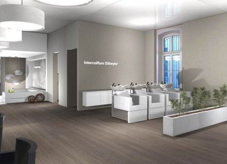 Ein Raum mit vielen Möbeln und einem Fenster