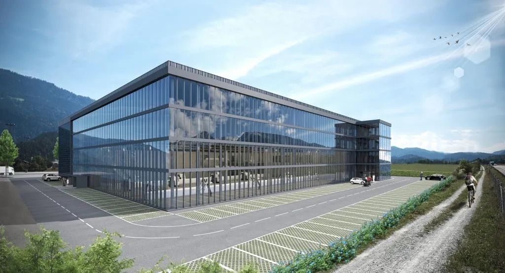 Künstlerische Darstellung eines großen Glasgebäudes mit Bergen im Hintergrund.