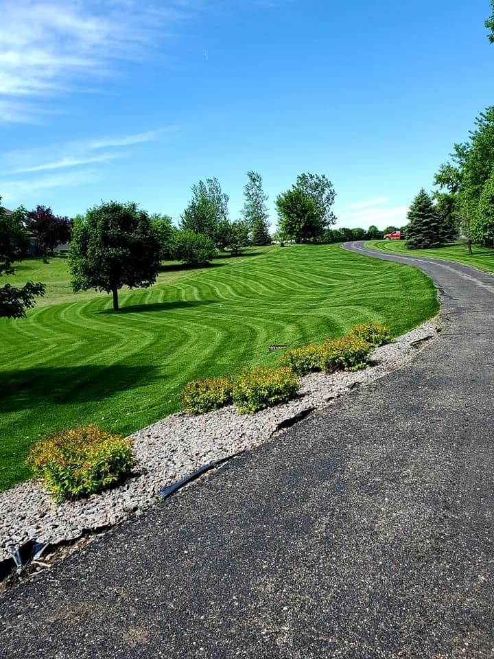 Green Lawn Near The Road — Hutchinson, MN — Green Earth Lawn Care