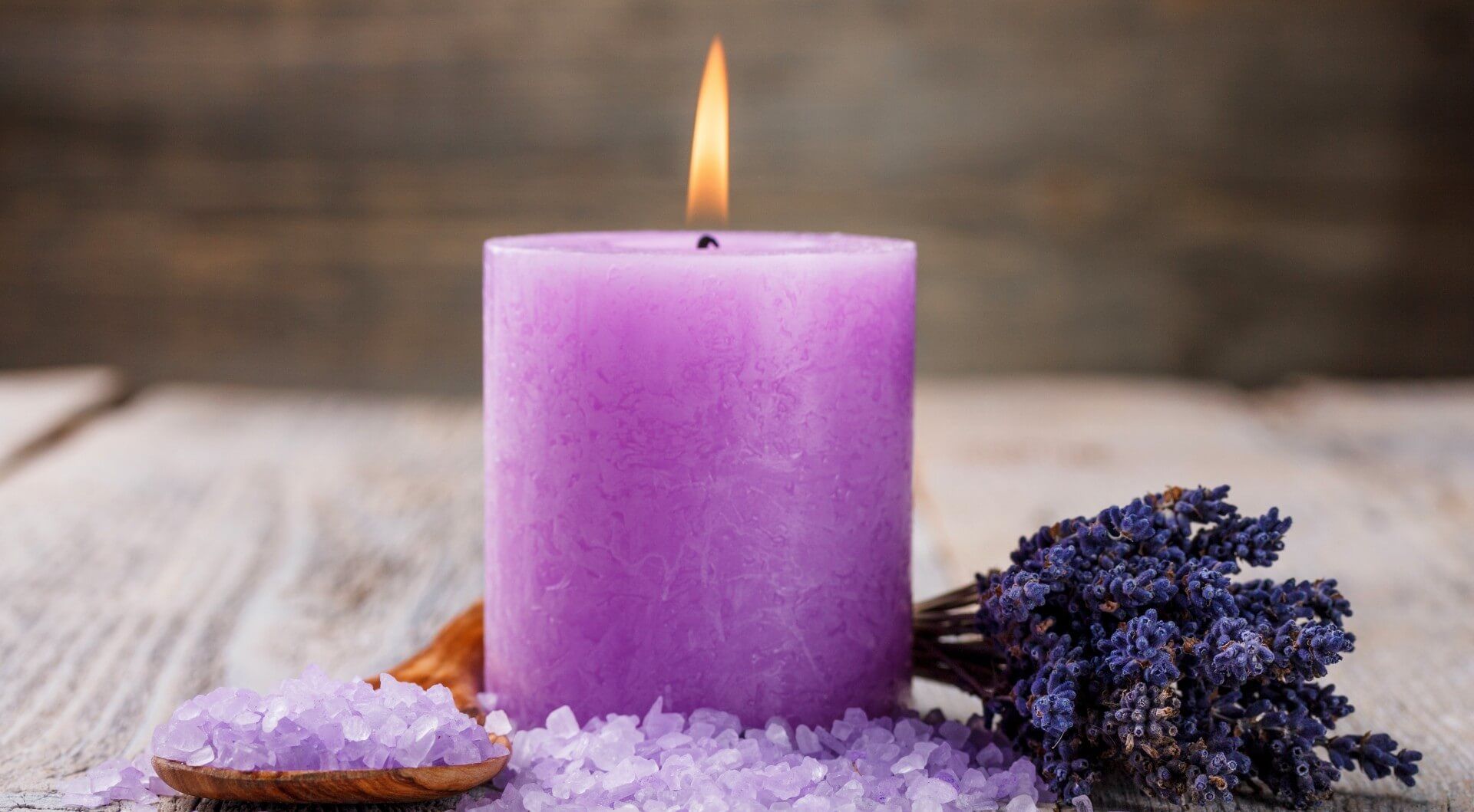 Purple lavender-scented candle that has the scent to drive bugs and pests away