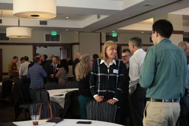 Local community leaders networking at the Northeast Kingdom Chamber of Commerce's Annual Meeting. 