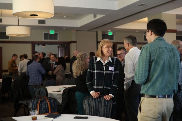Local community leaders networking at the Northeast Kingdom Chamber of Commerce's Annual Meeting. 