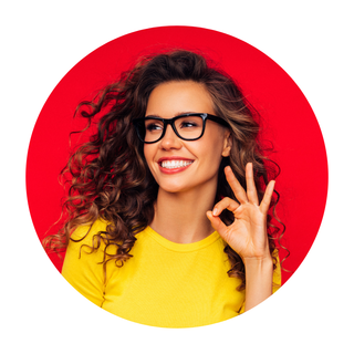a woman wearing glasses and a yellow shirt is giving an ok sign .