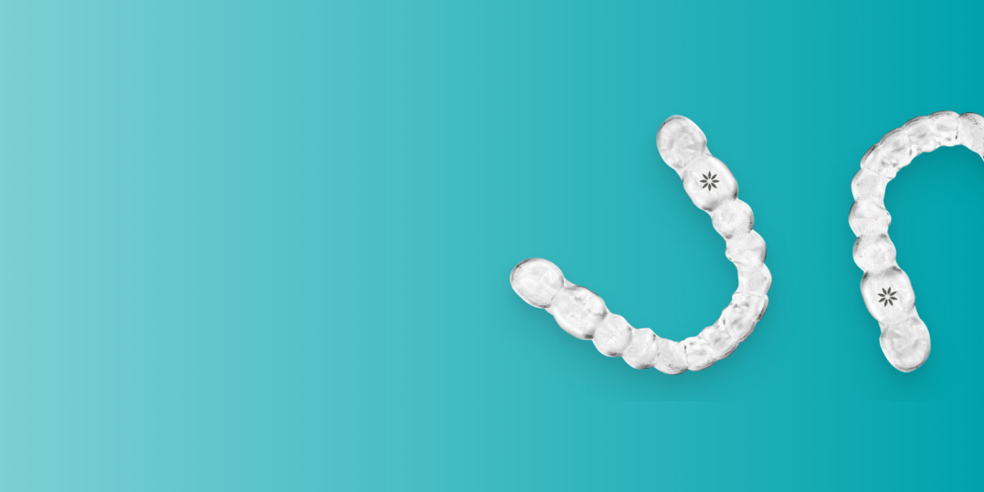 a pair of white Invisalign® aligners on a blue background .