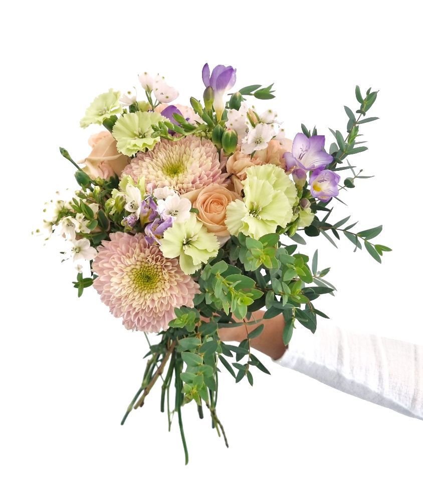 A person is holding a bouquet of flowers on a white background for Crayola Flowers.