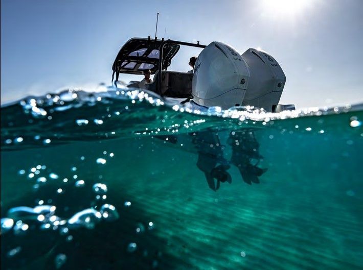 Double outboard motor in the water