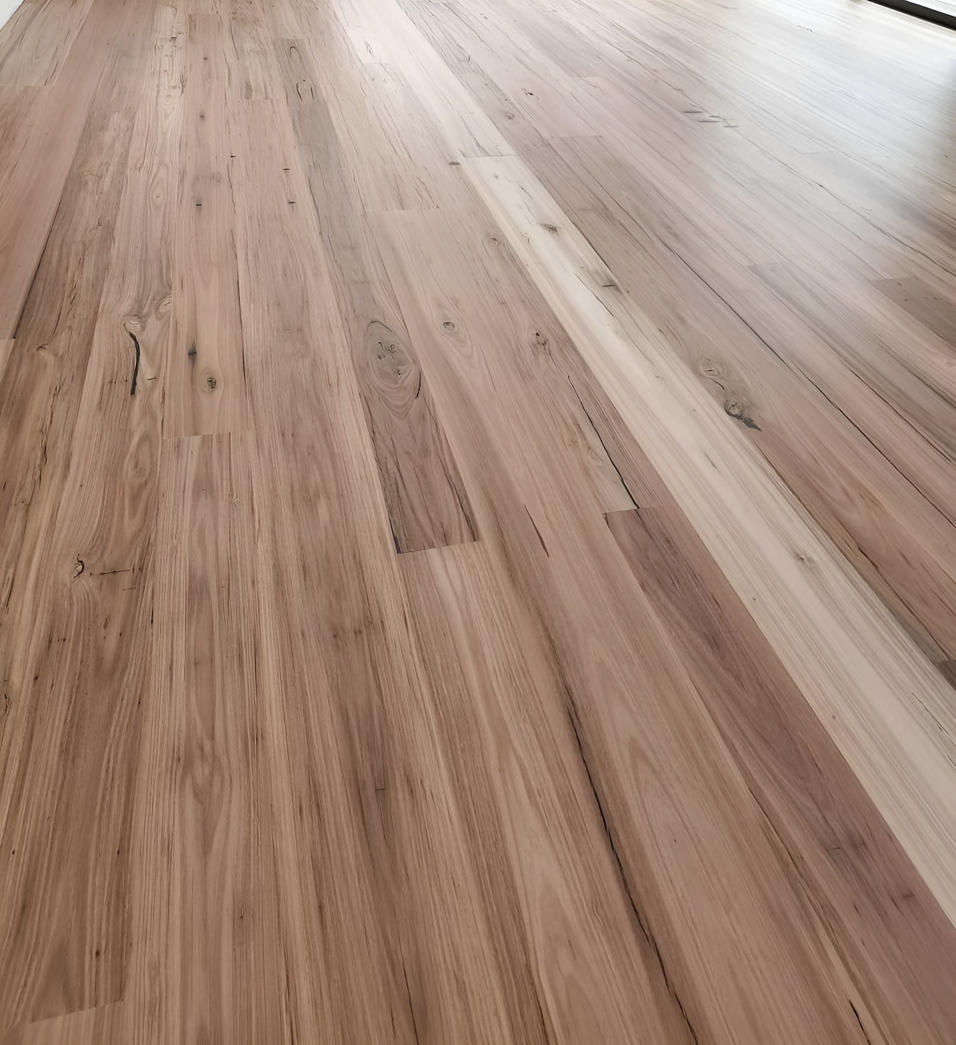 A Close Up Of A Wooden Floor In A Room — Kyall Chalker Floor Sanding & Polishing In Macquarie, NSW