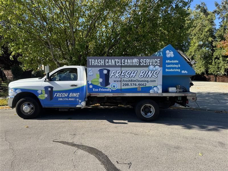 White truck with Fresh Bins logo, for trash can cleaning service.