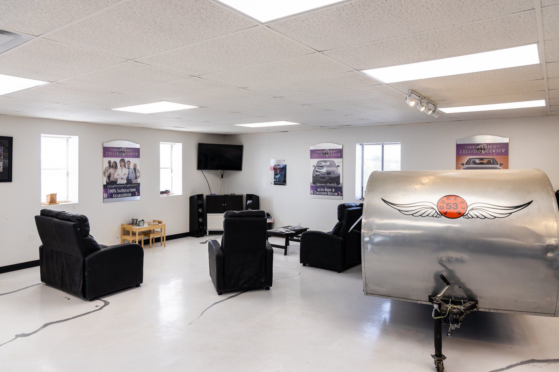 There is a trailer in the middle of the room.